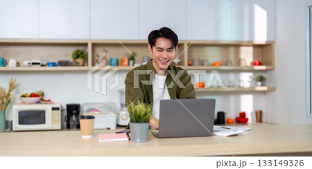 Working from Home. Happy Professional Engaged with Laptop and Coffee Working from Home. Happy Professional Engaged with Laptop and Coffee 133149326
