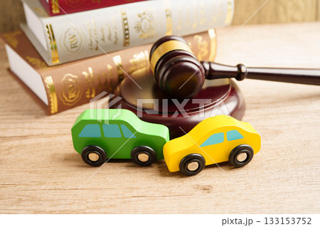 Car accident lawsuit and insurance, Judge hammer with car model. Car accident lawsuit and insurance, Judge hammer with car model. 133153752