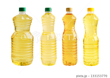 Vegetable oil in bottle isolated on white background. Vegetable oil in bottle isolated on white background. 133153770