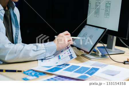 UX graphic designer planning application process development prototype wireframe for web smart phone. UX graphic designer planning application process development prototype wireframe for web smart phone. 133154358
