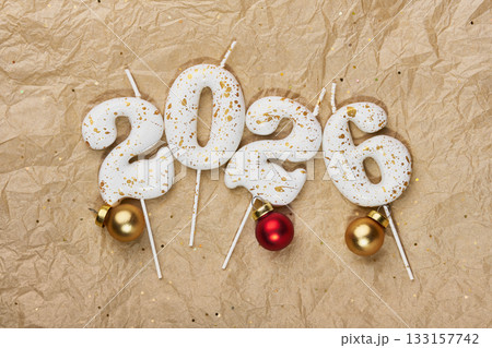 2026 candles and festive baubles creating a happy new year celebration concept 2026 candles and festive baubles creating a happy new year celebration concept 133157742