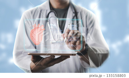 Modern healthcare concept with doctor controlling virtual ECG and heart data on futuristic for AI artificial intelligence diagnosis and treatment, telemedicine and innovative hospital solutions. Modern healthcare concept with doctor controlling virtual ECG and heart data on futuristic for AI artificial intelligence diagnosis and treatment, telemedicine and innovative hospital solutions. 133158803