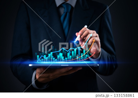 Business analytics with digital graph and growth chart on tablet for data visualization and financial technology with arrow trend and stock market. 133158861
