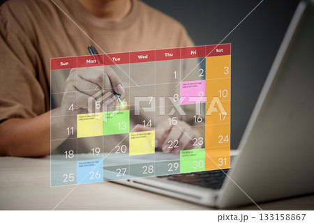 person using a digital calendar tasks and plan work. Time management, productivity, and online scheduling. The calendar remote work, and digital tools for efficient planning. 133158867
