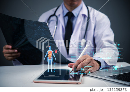 doctor using tablet with medical HUD display, telemedicine and AI diagnostics.Healthcare technology concept with physician analyzing patient data smart device with augmented reality overlay. doctor using tablet with medical HUD display, telemedicine and AI diagnostics.Healthcare technology concept with physician analyzing patient data smart device with augmented reality overlay. 133159278