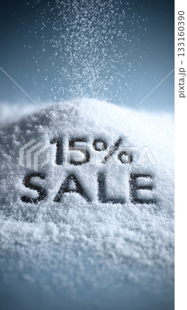Snowy surface with text displaying 15% sale, surrounded by falling snowflakes, creating a winter-themed promotional atmosphere for seasonal marketing campaigns 133160390