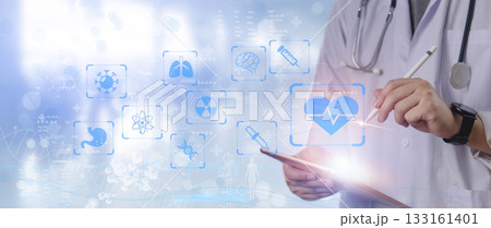 Hands of doctor engaging with digital medical interface, emphasizing connectivity in healthcare, medical innovation, health technology, global medical collaboration, patient-centric care. Hands of doctor engaging with digital medical interface, emphasizing connectivity in healthcare, medical innovation, health technology, global medical collaboration, patient-centric care. 133161401