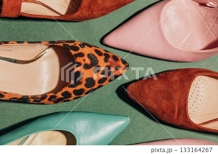 Vintage 1940s heels top view green background Vintage 1940s heels top view green background 133164267