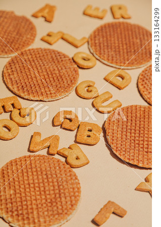 Dutch caramel waffles and letter-shaped cookies 133164299