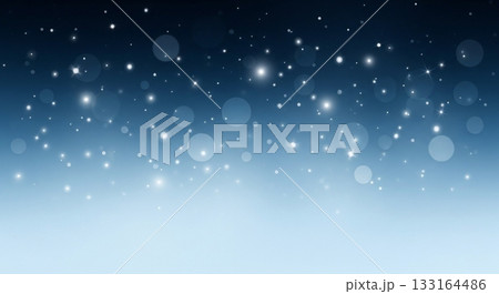 紺色から水色へのグラデーションにきらめく光の粒と玉ボケが幻想的に浮かぶ夜空の背景素材 133164486