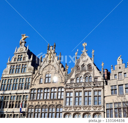 Guildhalls with crow stepped gables in Grote Markt Antwerp, Belgium, historical architecture under clear blue sky 133164836