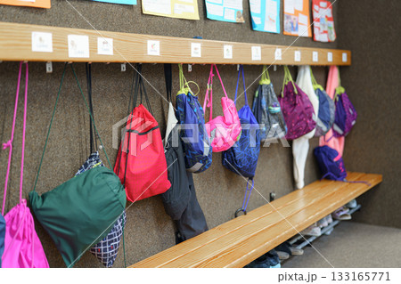 clothes hanging on a rail clothes hanging on a rail 133165771