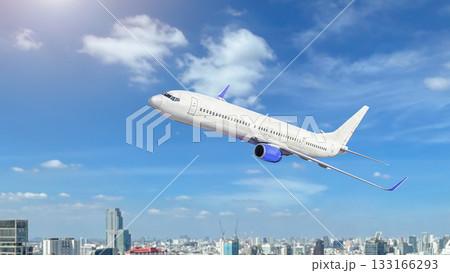 White passenger airplane flying in the sky White passenger airplane flying in the sky 133166293