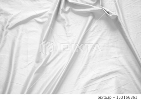 Abstract white wrinkled bedding sheet fabric texture background Abstract white wrinkled bedding sheet fabric texture background 133166863
