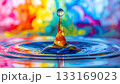 Colorful water drop creates vibrant ripples 133169023