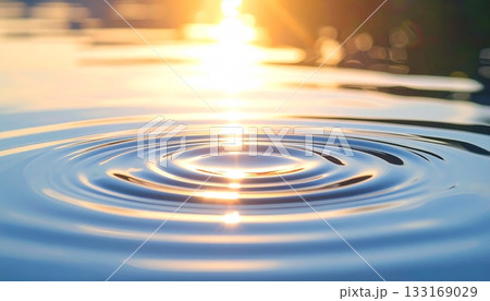 Sunlight dances on water ripples creating golden patterns Sunlight dances on water ripples creating golden patterns 133169029
