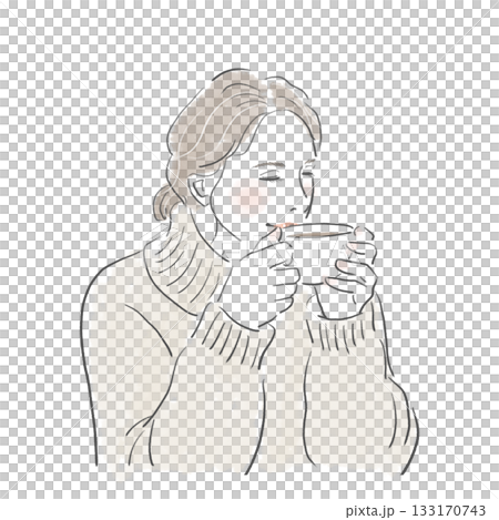 Young woman in a sweater drinking a hot drink 133170743