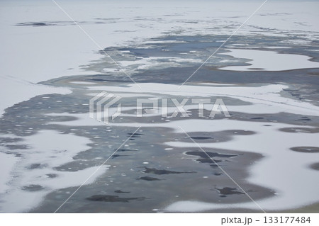 Frozen sea with snow and ice close-up 133177484