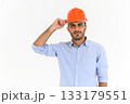 Portrait of young construction engineer wear orange hardhat, standing on white background with copy space. 133179551