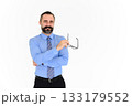 Portrait of confident middle-aged businessman in blue shirt and holding glasses with a beard and mustache standing on white background with copy space 133179552