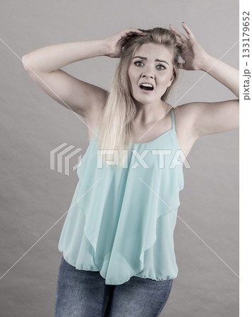 Emotional scared woman 133179652