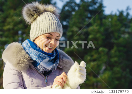 Female wearing warm outfit during winter Female wearing warm outfit during winter 133179770