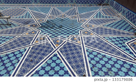Decorative geometric mosaic pattern featuring shades of blue and white, suitable for background use Decorative geometric mosaic pattern featuring shades of blue and white, suitable for background use 133179886