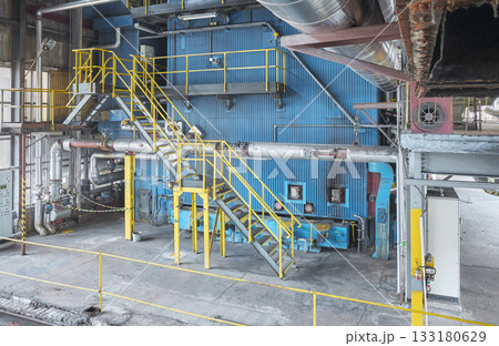 Interior of an old coal fired heating plant. Interior of an old coal fired heating plant. 133180629
