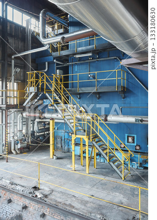 Interior of an old coal fired heating plant. Interior of an old coal fired heating plant. 133180630