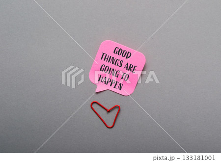 Colorful speech bubble with motivational quote and red paperclip heart on gray background Colorful speech bubble with motivational quote and red paperclip heart on gray background 133181001