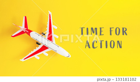 Small airplane is on a yellow background with the words Time for Action Small airplane is on a yellow background with the words Time for Action 133181102