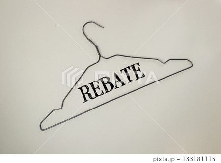Wire hanger with rebate text displayed prominently against a neutral background for retail concepts 133181115