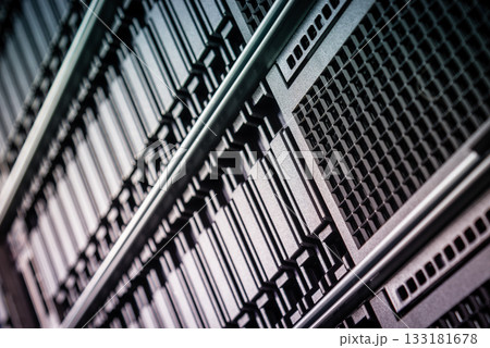 cluster of data storage SSD hard drives inside server rack 133181678