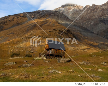 Lonely wooden house in the mountains 133181783