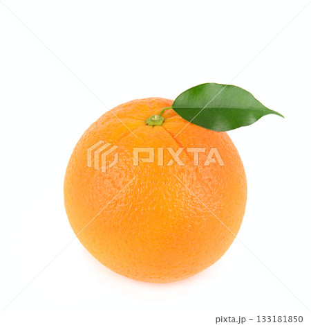 Single Fresh Orange with a Bright Green Leaf on White 133181850