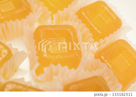 Orange marmalade. A sweet snack. Marmalade with different flavors and colors. 133182311