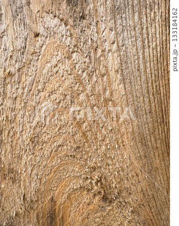 Texture of cut lumber. Brown wood texture as a background for use in any design. Texture of cut lumber. Brown wood texture as a background for use in any design. 133184162