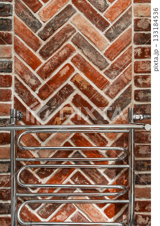 Vertical poster for bathroom design with heating battery on the wall decorated with natural brick, old style in the design of spaces in loft style Vertical poster for bathroom design with heating battery on the wall decorated with natural brick, old style in the design of spaces in loft style 133184536