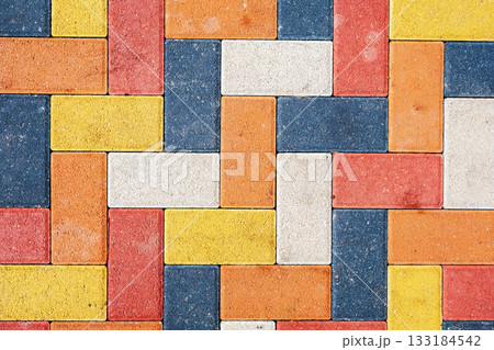 Multi-colored paving slabs, bright colors for decorating local areas, courtyards and streets in urban areas, flat layouts and advertising for the production of paving slabs 133184542