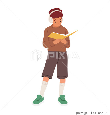 Full-length isolated portrait with cute smart boy student reading paper textbook enjoying education Full-length isolated portrait with cute smart boy student reading paper textbook enjoying education 133185492