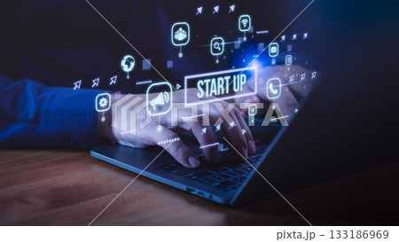 New generation using laptop computer with glowing startup icon, digital marketing, communication, and innovation symbols, representing business growth, entrepreneurship and technology-driven solution. 133186969