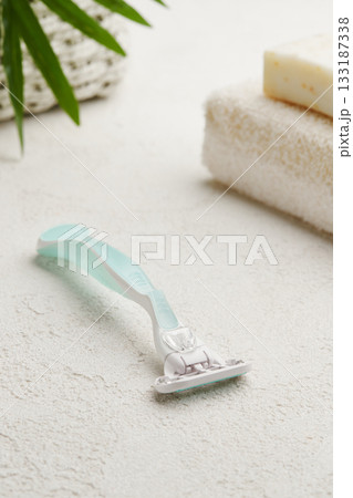 High-quality razor showcased on a sophisticated white backdrop. Grooming routine with style and precision 133187338