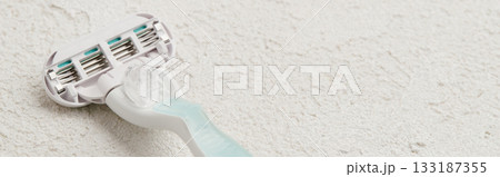 High-quality razor showcased on a sophisticated white backdrop. Grooming routine with style and precision 133187355