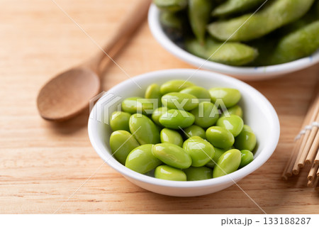 Boiled Edamame beans (Japanese soybeans) in a bowl on wooden background 133188287