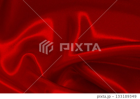 Dark red fabric cloth texture for background and design art work, beautiful crumpled pattern of silk or linen. 133189349