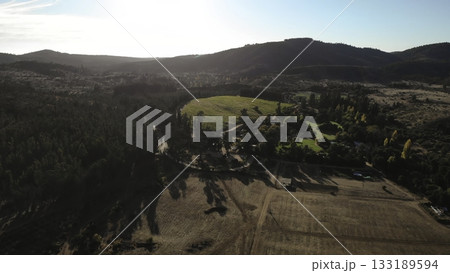 Aerial view flying over a vast rural landscape Aerial view flying over a vast rural landscape 133189594