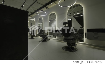Modern barbershop interior with stylish chairs. Clip 133189792