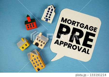 Mortgage Pre-Approval text with house models on blue background 133191214