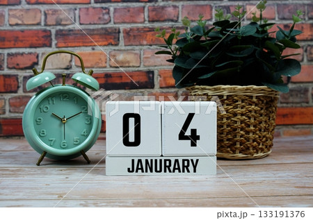 Wooden Calendar Showing the Date of January 4th. Day 4 of January month Wooden Calendar Showing the Date of January 4th. Day 4 of January month 133191376