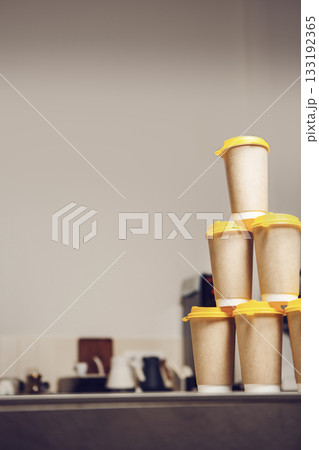 Stack of Coffee Cups on Counter 133192365